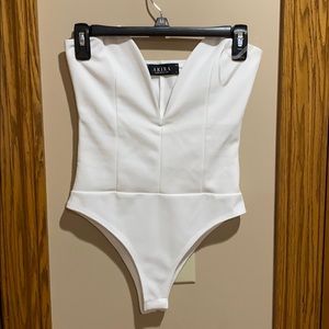 Akira white strapless bodysuit. BRAND NEW